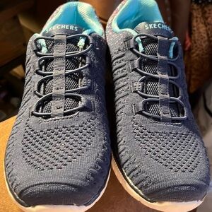 Woman’s Skechers slip on with bungee